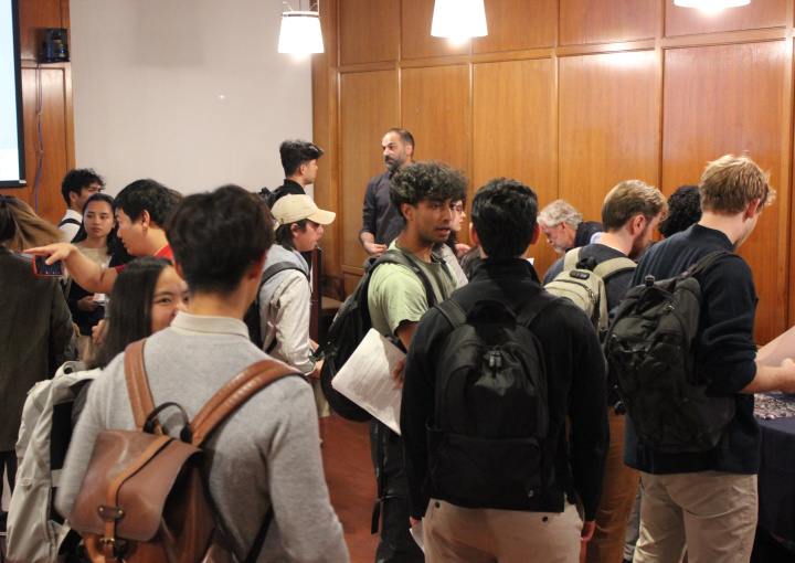 Students networking with employers and alumni.
